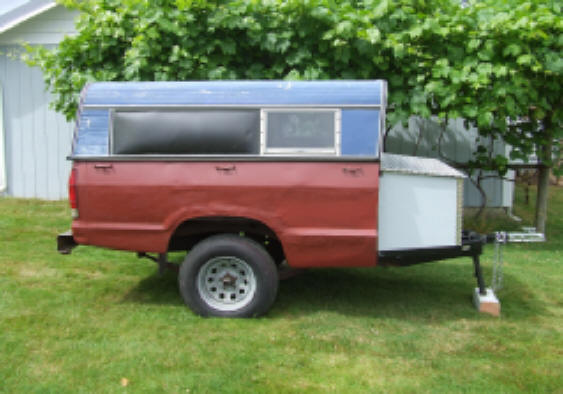 Truck bed shop camper trailer